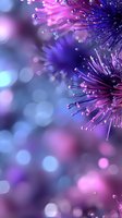Macro shot of glowing purple and blue flower stamens with water drops against blurred bokeh background, creating dreamy ethereal nature atmosphere.