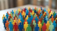 Colorful miniature people figures standing together in crowd formation representing diversity, teamwork, community unity and social connection concepts.