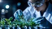Scientist in protective glasses and gloves examining glowing molecular structure with plants in modern laboratory. Blue toned research concept.