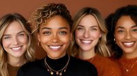 Diverse group of young women with bright genuine smiles wearing casual attire against brown background, representing friendship, inclusivity and joy.