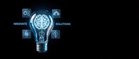 Digital brain lightbulb with innovation icons on dark background for technology and creative business concepts.
