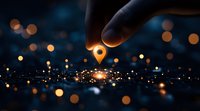 Finger touching glowing location pin marker against blurred city lights background with bokeh effect, concept of navigation and GPS technology.
