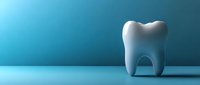 White tooth model on blue gradient background, isolated for dental care, orthodontics, and healthcare design projects.