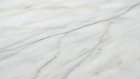 Elegant white marble surface with natural gray veining patterns creating luxurious texture for interior design and architectural applications.