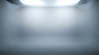 Empty studio room with soft blue-gray gradient background and ceiling lights, clean minimal space for product display or photography backdrop.