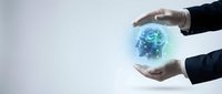 Business hands protecting glowing brain with neural networks representing artificial intelligence, machine learning and cognitive technology innovation.