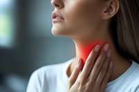 Woman touching painful inflamed throat area shown in red, experiencing discomfort and difficulty swallowing. Medical concept showing sore throat symptoms.