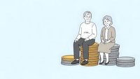 Senior couple sitting on stacks of coins planning retirement savings and financial future together on light background.