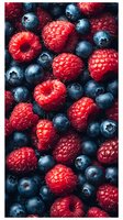 Fresh ripe raspberries and blueberries background macro shot. Natural organic berries pattern with vibrant red and blue colors for healthy eating concept.