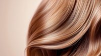 Silky smooth brown hair strands flowing in gentle waves against neutral background, showing natural shine and healthy texture for beauty and haircare advertising.