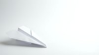 White paper airplane on clean white background with soft shadow, minimalist composition for business concepts and creative projects.