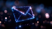 Glowing digital envelope made of blue light particles and sparkles floating on dark background with bokeh effect, representing electronic mail communication.