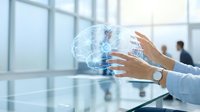 Businessman hands interacting with holographic brain projection in modern office environment showcasing artificial intelligence and neural network technology.