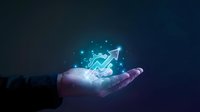 Businessman hand holding glowing upward arrow with financial growth chart and digital particles, representing business success, investment returns, and market growth strategy.