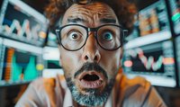 Shocked male trader with glasses and beard reacting to market crash, dramatic close-up portrait against blurred stock market charts and data screens background.