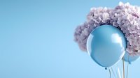 Pastel blue balloon with delicate pink hydrangea flowers against light blue background, creating soft romantic minimalist composition for celebration designs.