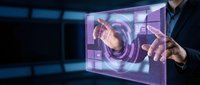 Businessman in suit touching holographic digital interface with glowing purple and blue technology display, representing innovation and future digital transformation.