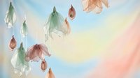 Delicate watercolor autumn leaves floating on soft pastel background with gentle color gradients for seasonal design projects and nature artwork.