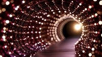 Glowing spiral tunnel with red and white bokeh lights creating magical perspective effect. Abstract futuristic corridor leads to bright light at end.