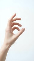 Female hand making OK gesture on white background isolated for design projects and business communication concepts.