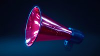 Pink and blue megaphone with glowing neon effect against dark background, dramatic lighting creates futuristic atmosphere for communication and announcement concepts.