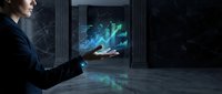Professional woman interacting with holographic data visualization display in modern office environment for business technology presentations.