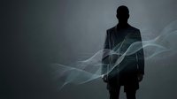 Silhouette of male professional in dark business suit with digital wave overlay and light effects, representing technology, innovation, and corporate transformation for business concepts.