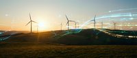 Wind turbines generating renewable energy at sunset with digital network connections overlay representing smart grid technology and sustainable power solutions.