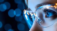 Close-up of a person wearing clear eyeglasses with blue bokeh lights reflecting on the lenses and face, suitable for eyewear, vision, and technology concepts.