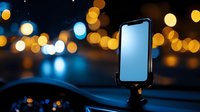 Modern smartphone mounted on car dashboard holder against blurred city night lights and bokeh background, glowing blue screen display.