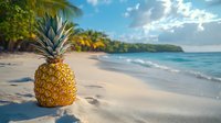 Fresh ripe pineapple on sandy tropical beach with turquoise ocean waves, palm trees and dramatic cloudy sky in background, summer vacation concept.