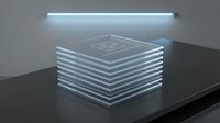 Stacked translucent glass or acrylic sheets with glowing edges arranged in a cube formation on a black surface under modern lighting for design and technology concepts.