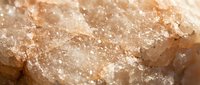 Closeup of brown sugar crystals with granulated texture and sweet coating, suitable for baking, cooking, and food photography projects.