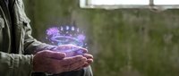 Hands cupping glowing purple digital brain with neural network connections, artificial intelligence concept for technology and innovation projects.