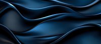 Abstract wavy dark blue silk fabric background with smooth flowing curves and glossy satin texture creating elegant ripples and folds.