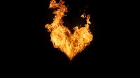 Bright orange flame in heart shape against black background, dramatic fire effect creates romantic yet powerful symbol for passion and desire.