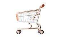 Empty shopping cart on white background, metallic chrome finish with wheels, isolated retail equipment for supermarket and store use.