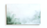 Soft green watercolor wash creates ethereal misty background effect with gentle color transitions and delicate texture, suitable for artistic designs and layouts.