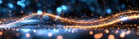 Glowing golden light waves with blue bokeh effects flow across dark background creating magical energy stream with sparkling particles.