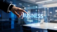 Professional businessman hand pointing at glowing business text in modern corporate office environment for digital marketing and entrepreneurship concepts.
