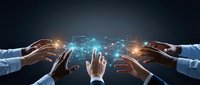 Business hands reaching toward glowing digital network connections with data visualization and light effects on dark background for technology concepts.