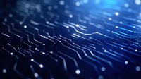 Abstract blue circuit board pattern with glowing connections and depth of field effect creates modern technology background for digital concepts.