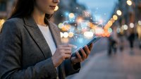Professional businesswoman using smartphone with digital shopping cart icons floating above screen in urban evening setting for mobile commerce and retail technology.