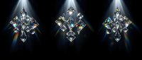 Three sparkling diamond clusters with prismatic light beams creating rainbow reflections on black background for luxury jewelry and gemstone designs.