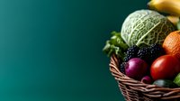 Fresh organic produce in woven basket against dark green background, including colorful fruits and vegetables. Healthy eating and farm market concept.