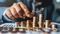 Business growth concept showing stacked coins with upward trending graph line, perfect for financial planning, investment strategy and wealth management presentations.