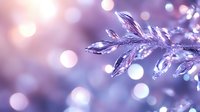 Sparkling crystal snowflake with water drops on purple bokeh background, macro winter photography with soft focus and dreamy atmosphere.