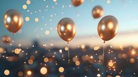 Golden balloons floating against blurred sunset sky with magical bokeh lights and sparkles creating dreamy festive atmosphere for celebration background.