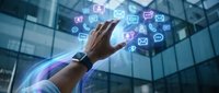 Professional hand reaching toward floating digital icons including social media, messaging, and communication symbols in modern office environment with glass building backdrop.