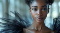 Young African American woman with natural curly hair in buns, wearing black feathers, artistic beauty portrait with soft blue background and dramatic lighting.